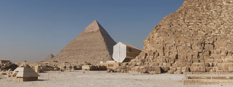 The pyramids of Giza in 2010. The long building beside the Great Pyramid housed Khufu's ship, near the pit where it was found in 1954.
