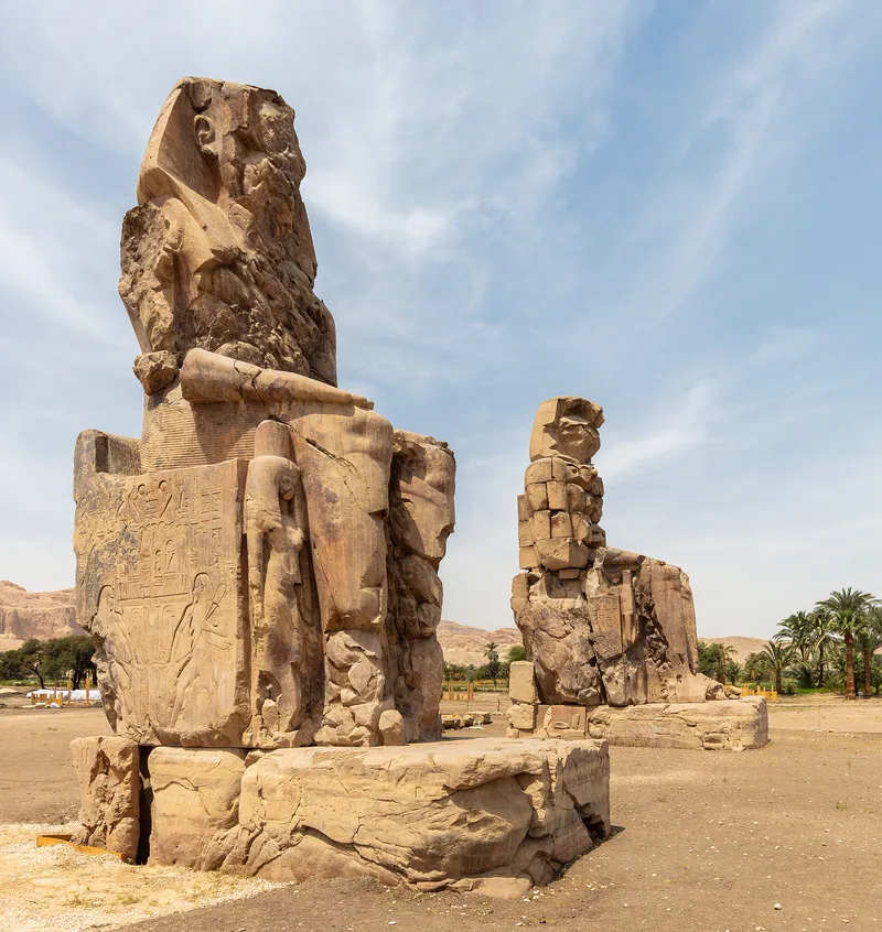 The Colossi of Memnon: two statues of Amenhotep III that stood at the gate of his memorial temple.