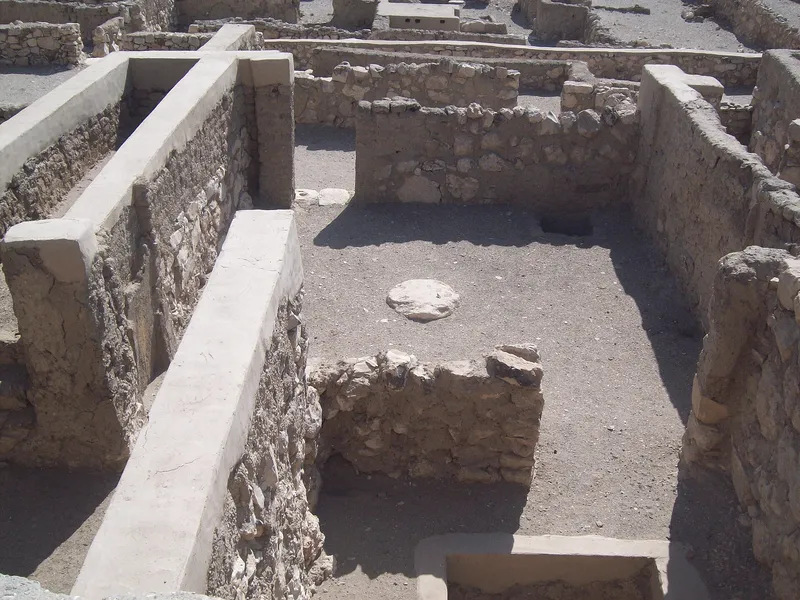 Stone walls of the houses at Deir el-Medina, the village of the royal tomb builders.