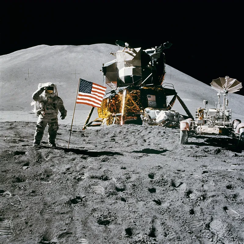 Apollo 15 astronaut James Irwin with the Lunar Roving Vehicle and lunar module in 1971.