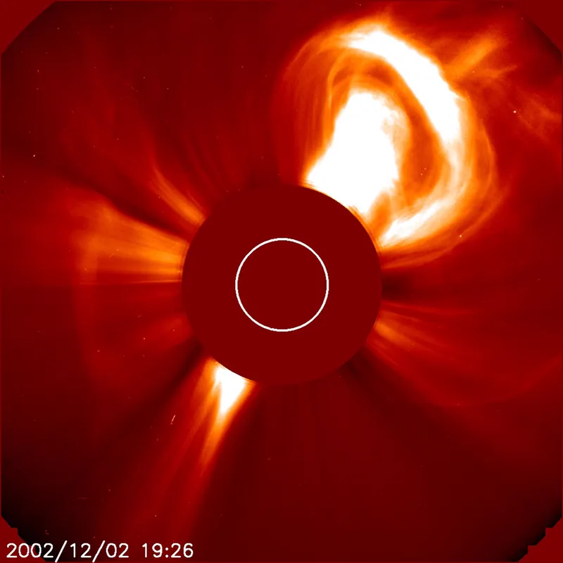 A coronal mass ejection: a huge cloud of charged gas thrown out by the Sun.