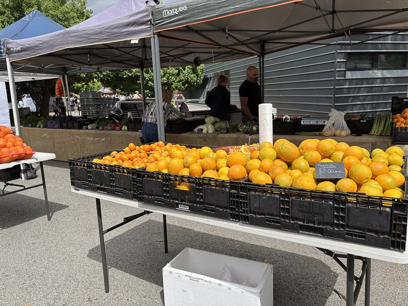 A fruit and vegetable stall at a farmers' market.