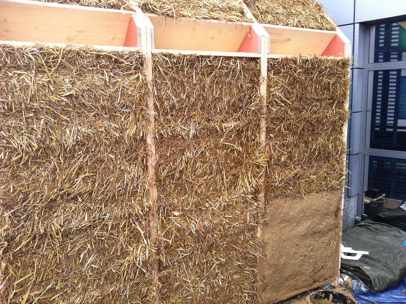 A straw bale wall before plastering.