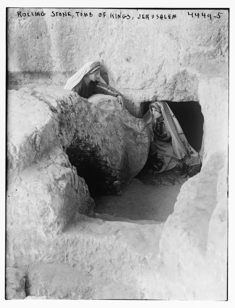 A round rolling stone in front of the Tomb of the Kings in Jerusalem, in an old photo.