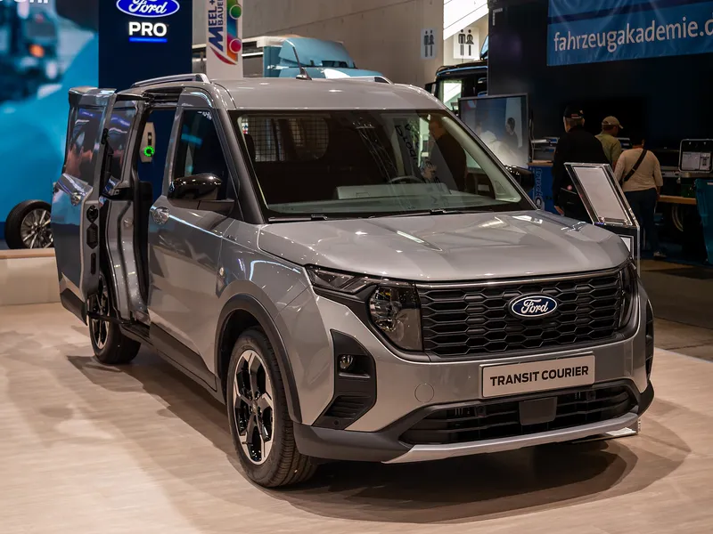 A small delivery van at a trade show in Germany.