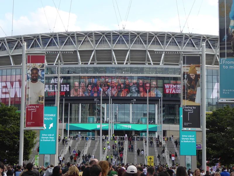 Wembley Stadium in London filled with spectators.