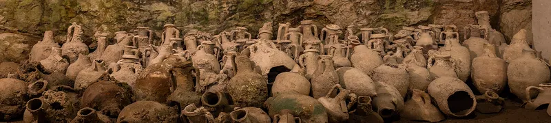 Roman amphorae displayed beneath the amphitheater in Pula, Croatia.