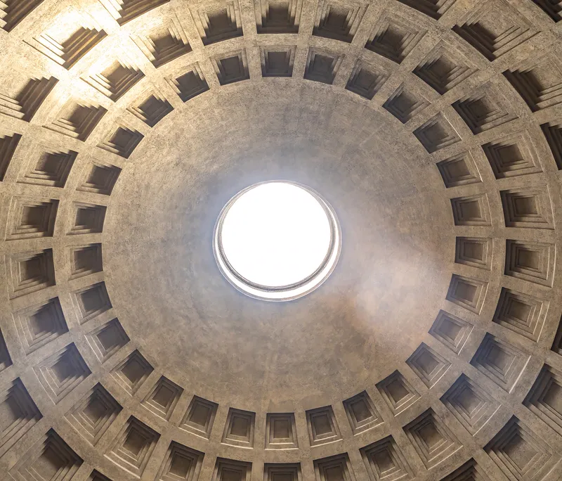 Looking up into the dome: rings of sunken coffers lead to the open oculus.